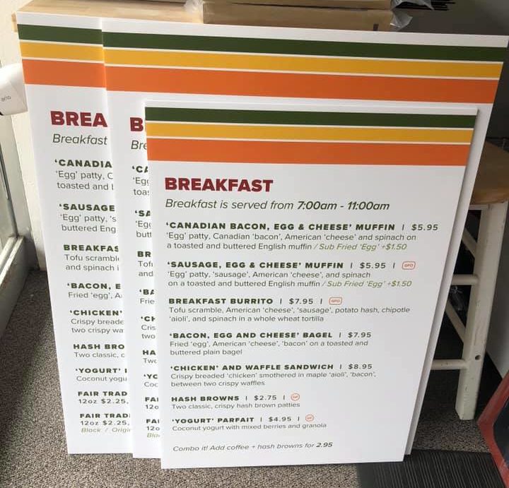 Large printed menu signs for a restaurant