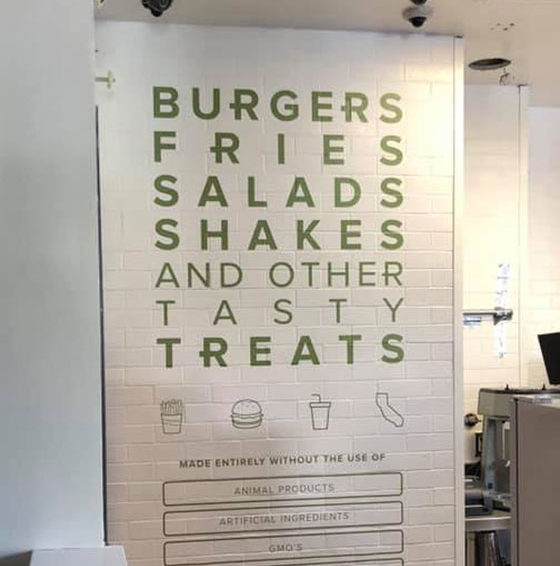 Applied wall graphics for a restaurant showing the menu