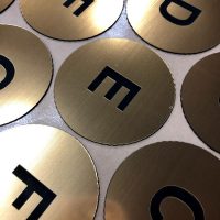 UV printed adhesive number plates on acrylic