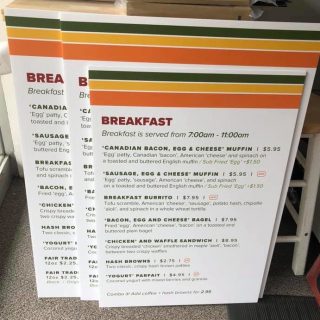 Large printed menu signs for a restaurant