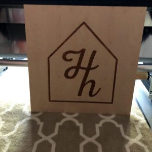 Laser engraved wood sign for business