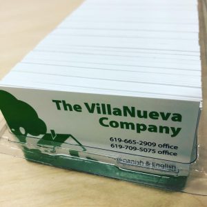 Stack of business cards printed in-house