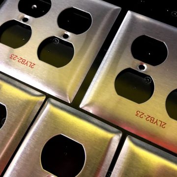 Laser marked plug plates