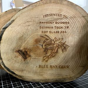 Laser engraved patterns in stump of wood