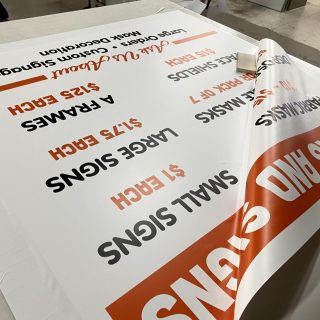 Store Sign being printed