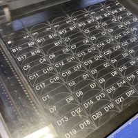 Acrylic Number plates being laser engraved on laser