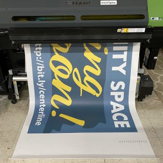 Large Vinyl Banner being printed on large printer