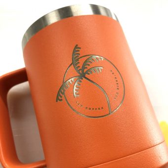 Laser engraved tumbler with handle