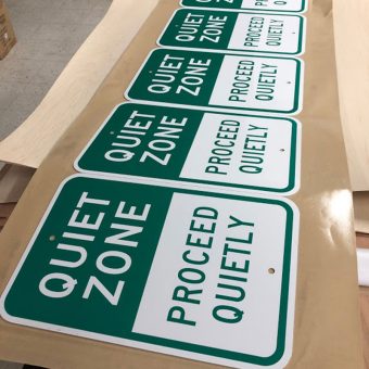 Multiple UV printed parking signs