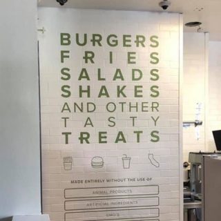 Applied wall graphics for a restaurant showing the menu